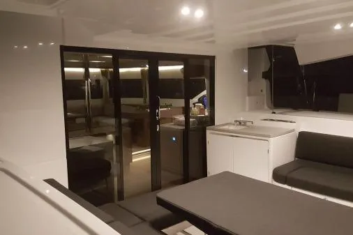 Lone Star Lagoon Yacht Photos Pics Interior of 2019 Lagoon 50 catamaran with modern seating and sleek design.