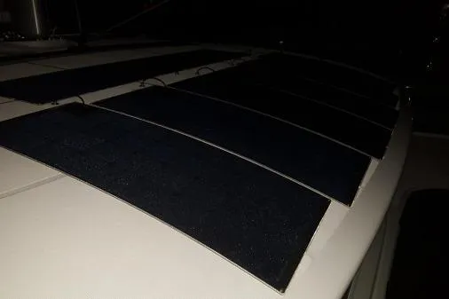Lone Star Lagoon Yacht Photos Pics Solar panels on 2019 Lagoon 50 yacht roof at night.