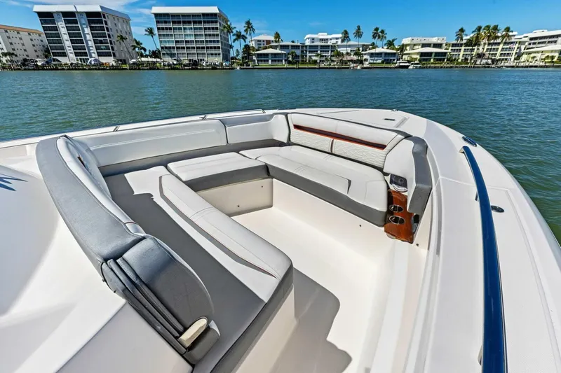 Luna B Yacht Photos Pics Luxurious seating area on 2018 Tiara Yachts 38 LS, with waterfront view.