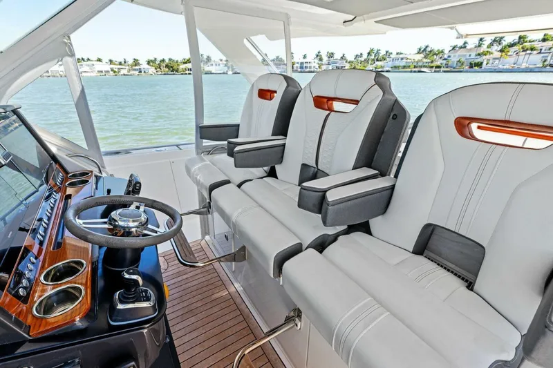 Luna B Yacht Photos Pics 2018 Tiara Yachts 38 LS helm with luxurious seating and modern controls.