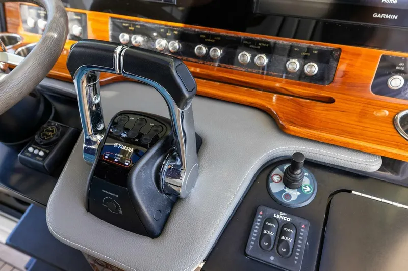 Luna B Yacht Photos Pics Control panel of a 2018 Tiara Yachts 38 LS, featuring Yamaha throttle and joystick.