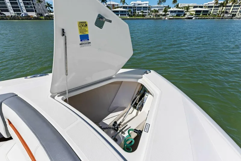 Luna B Yacht Photos Pics 2018 Tiara Yachts 38 LS anchor locker open on calm water.