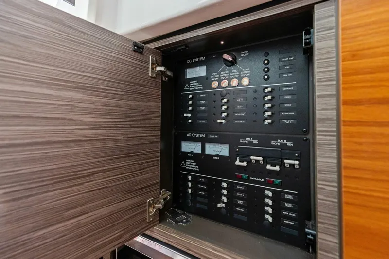 Luna B Yacht Photos Pics Electrical panel inside a 2018 Tiara Yachts 38 LS, showcasing AC and DC systems.