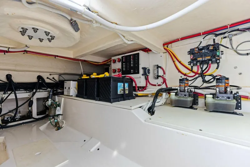 Luna B Yacht Photos Pics Electrical system of a 2018 Tiara Yachts 38 LS, featuring batteries and wiring.