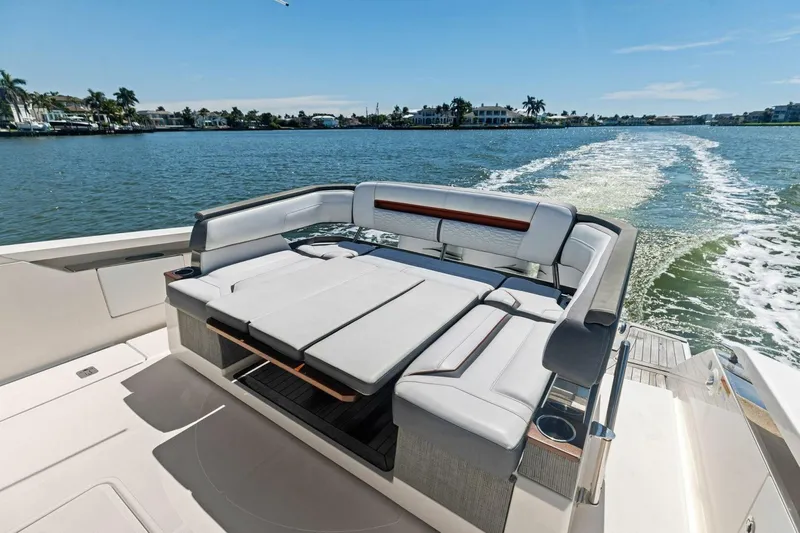 Luna B Yacht Photos Pics 2018 Tiara Yachts 38 LS luxury boat with spacious seating on open water.