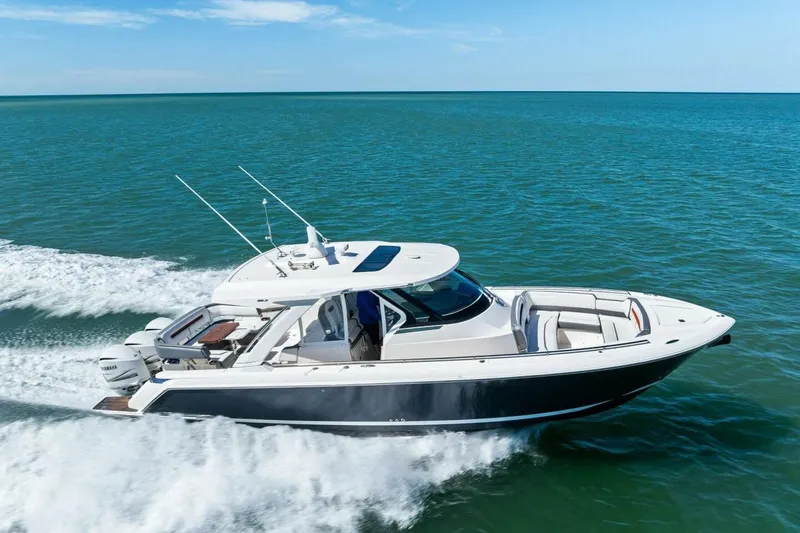 Luna B Yacht Photos Pics 2018 Tiara Yachts 38 LS cruising on open water, showcasing sleek design and performance.