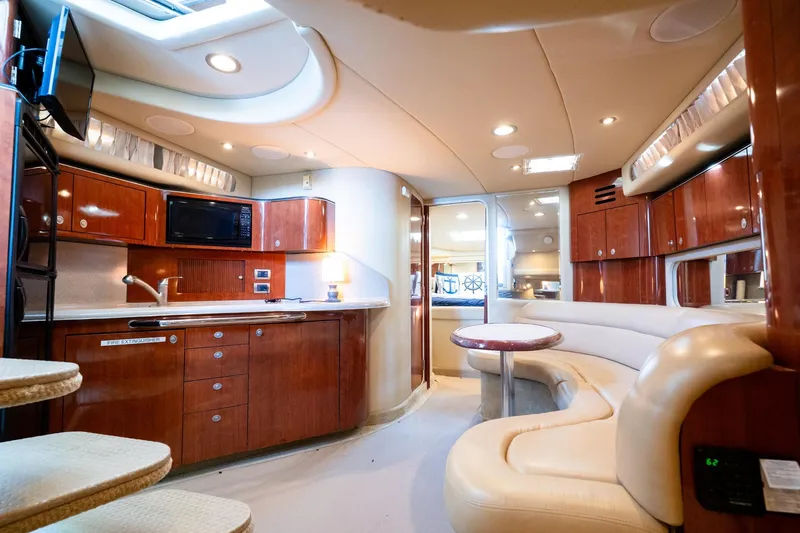 Murphys Law Yacht Photos Pics Luxurious interior of a 2004 Sea Ray 380 Sundancer yacht with modern amenities.