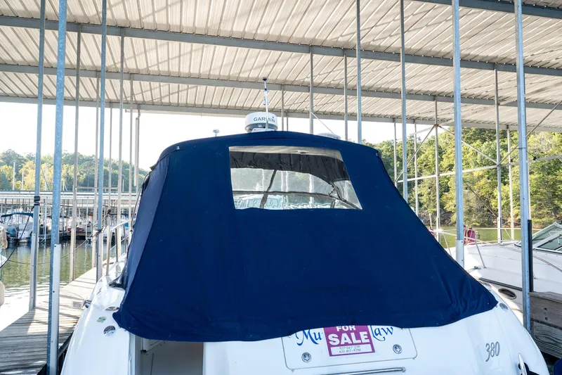 Murphys Law Yacht Photos Pics 2004 Sea Ray 380 Sundancer yacht with blue cover, docked and for sale.