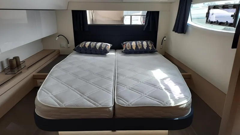 Super Trouper Yacht Photos Pics Luxurious cabin interior of 2019 Fountaine Pajot Saona 47 catamaran with twin beds.