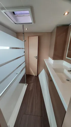 Super Trouper Yacht Photos Pics Modern bathroom interior of 2019 Fountaine Pajot Saona 47 catamaran.
