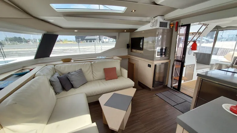 Super Trouper Yacht Photos Pics Luxurious interior of 2019 Fountaine Pajot Saona 47 catamaran with modern furnishings.