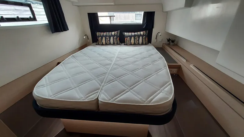 Super Trouper Yacht Photos Pics Luxurious cabin interior of 2019 Fountaine Pajot Saona 47 catamaran with a spacious bed.