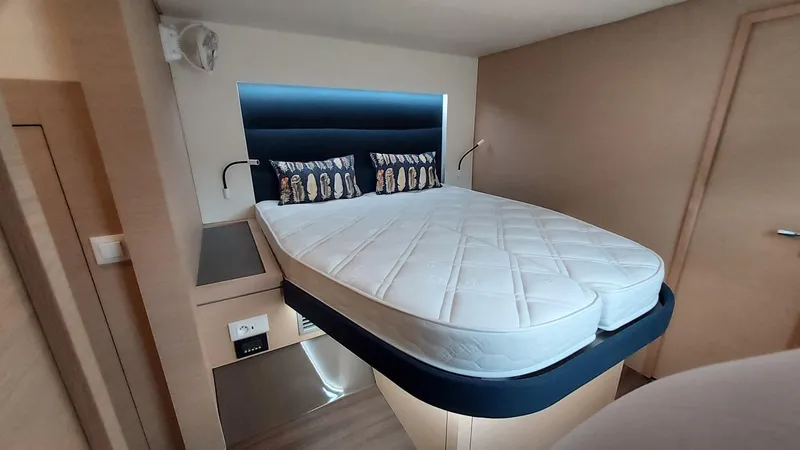 Super Trouper Yacht Photos Pics Luxurious bedroom interior of 2019 Fountaine Pajot Saona 47 catamaran with modern design.