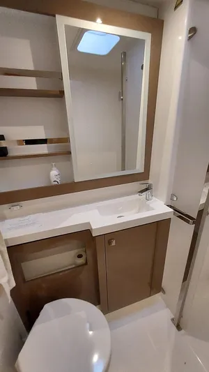 Super Trouper Yacht Photos Pics 2019 Fountaine Pajot Saona 47 yacht bathroom with modern fixtures and sleek design.