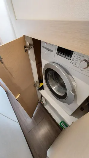 Super Trouper Yacht Photos Pics Washing machine in 2019 Fountaine Pajot Saona 47 yacht's compact laundry area.