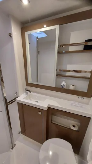 Super Trouper Yacht Photos Pics Modern bathroom in 2019 Fountaine Pajot Saona 47 yacht with sleek fixtures and ample storage.
