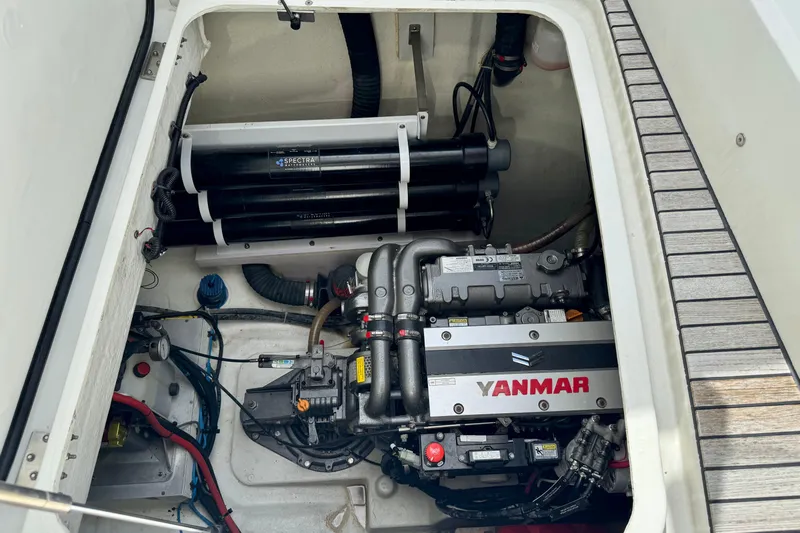 Promprang Yacht Photos Pics Engine compartment of a 2020 Lagoon 50 catamaran with Yanmar engine and Spectra watermaker.