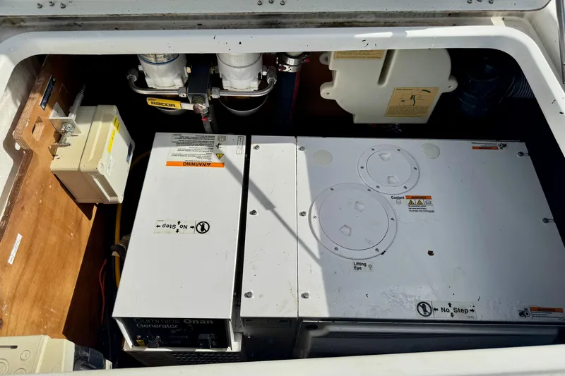 Promprang Yacht Photos Pics Engine compartment of a 2020 Lagoon 50 catamaran with Cummins Onan generator.