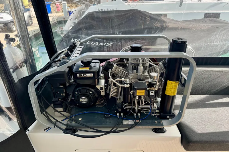 Promprang Yacht Photos Pics Engine compartment of a 2020 Lagoon 50 yacht, featuring a 9.0 horsepower motor.