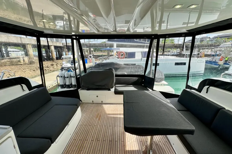 Promprang Yacht Photos Pics Interior view of 2020 Lagoon 50 catamaran with spacious seating and modern design.