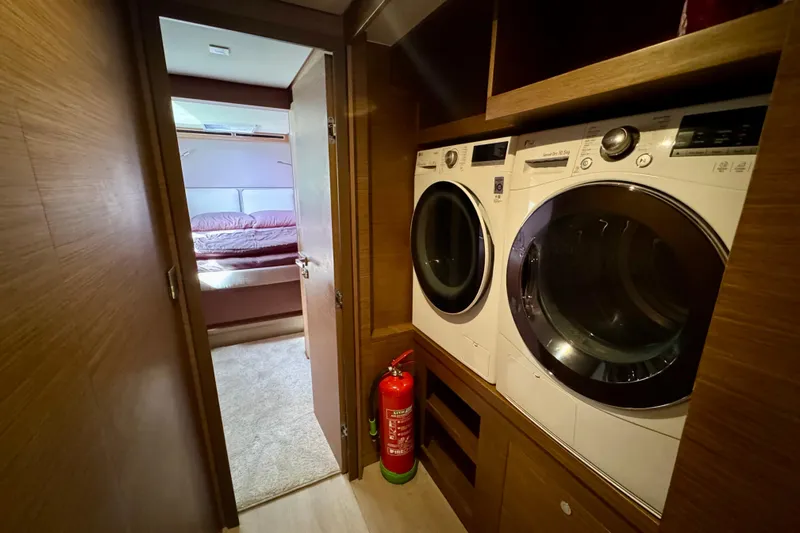 Promprang Yacht Photos Pics Laundry area with washer and dryer on Lagoon 50 yacht, 2020 model.