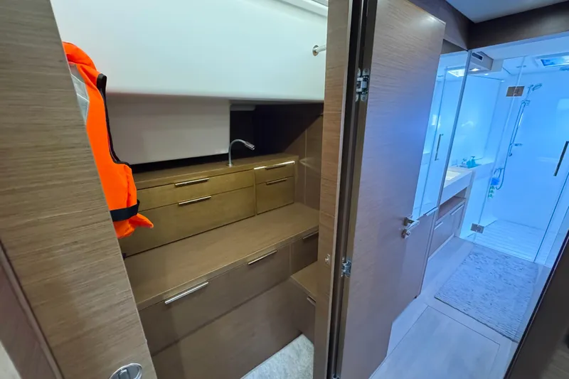Promprang Yacht Photos Pics Interior of 2020 Lagoon 50 yacht featuring a modern bathroom and storage area.