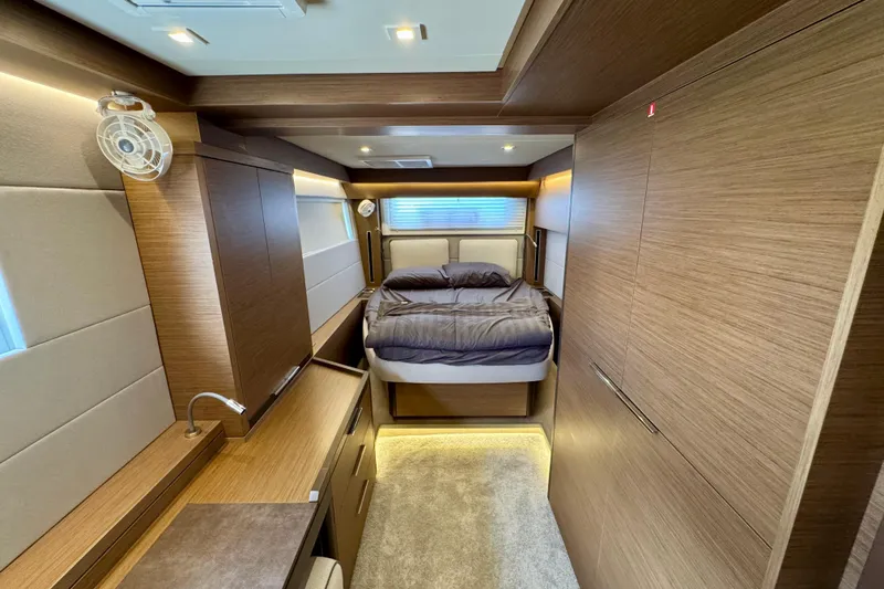 Promprang Yacht Photos Pics Luxurious interior cabin of 2020 Lagoon 50 yacht with modern wood finish.