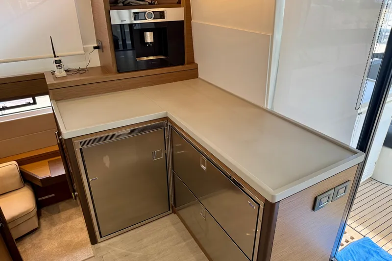 Promprang Yacht Photos Pics Modern kitchen area in a 2020 Lagoon 50 yacht with sleek appliances and ample counter space.