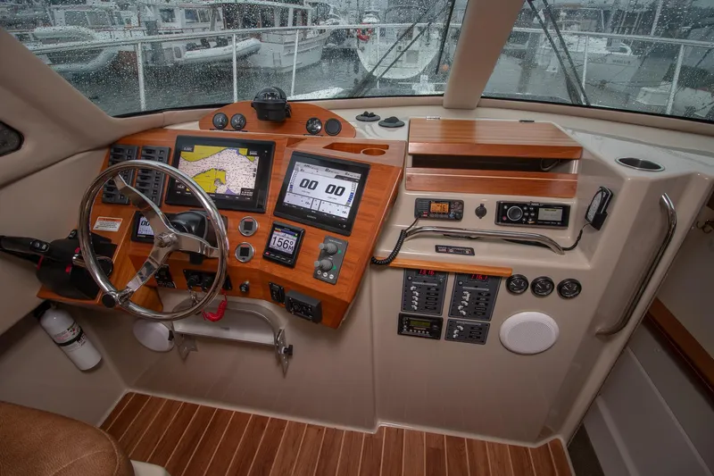  Yacht Photos Pics Cockpit of 2021 Aspen C108 boat with navigation screens and controls.