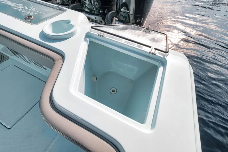 One Time Yacht Photos Pics 2024 Front Runner 36 Center Console boat with open storage compartment on deck.