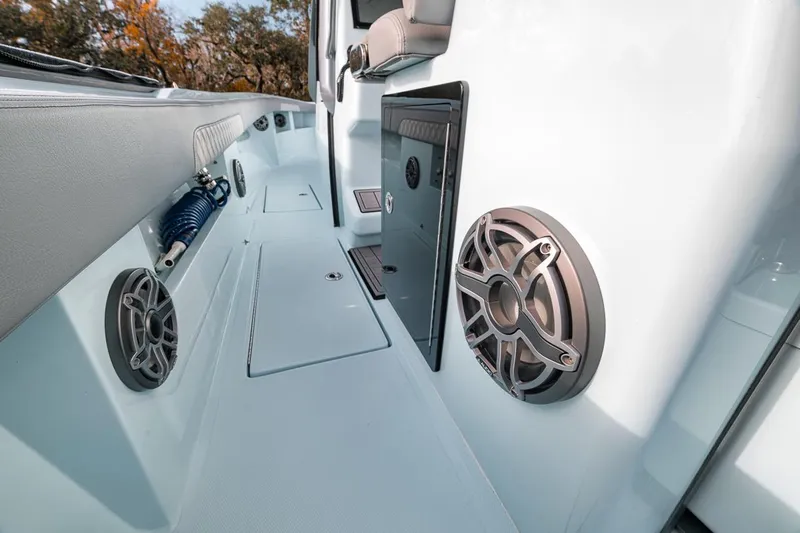 One Time Yacht Photos Pics 2024 Front Runner 36 Center Console boat interior with speakers and storage compartments.