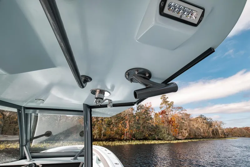 One Time Yacht Photos Pics 2024 Front Runner 36 Center Console boat, interior view with scenic river backdrop.