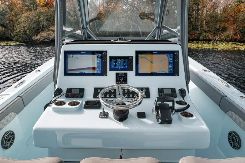 One Time Yacht Photos Pics 2024 Front Runner 36 Center Console boat dashboard with advanced navigation displays.