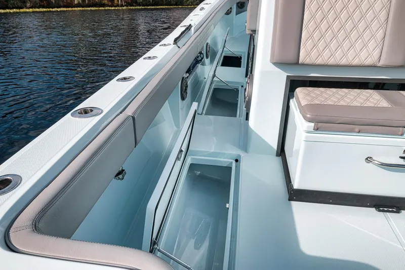 One Time Yacht Photos Pics 2024 Front Runner 36 Center Console boat interior with seating and storage compartments.