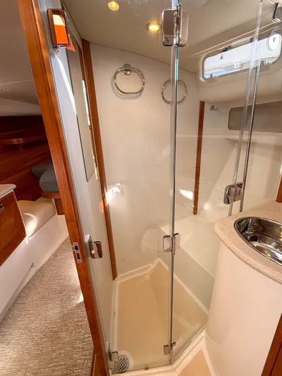 Wild Rose Yacht Photos Pics 2015 MJM 36z Downeast yacht bathroom with glass shower and modern fixtures.