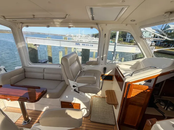Wild Rose Yacht Photos Pics Luxurious interior of 2015 MJM 36z Downeast yacht with waterfront view.