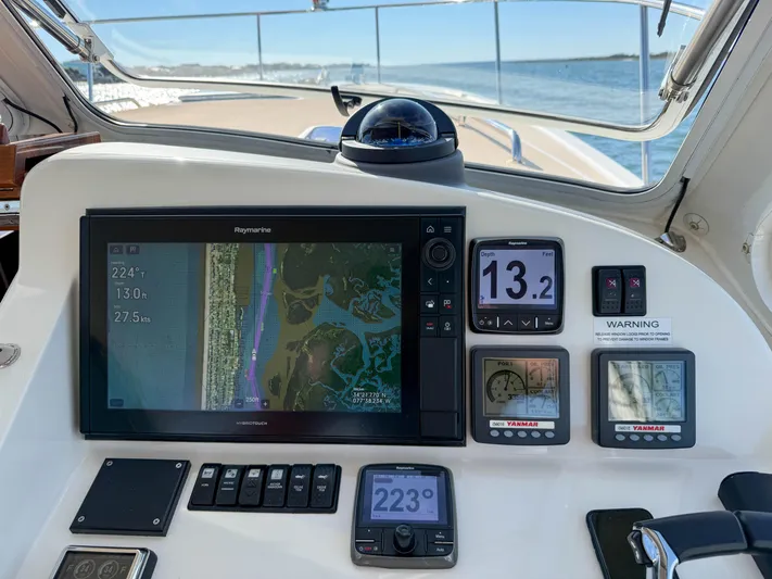 Wild Rose Yacht Photos Pics MJM 36z Downeast 2015 boat dashboard with navigation and control displays.