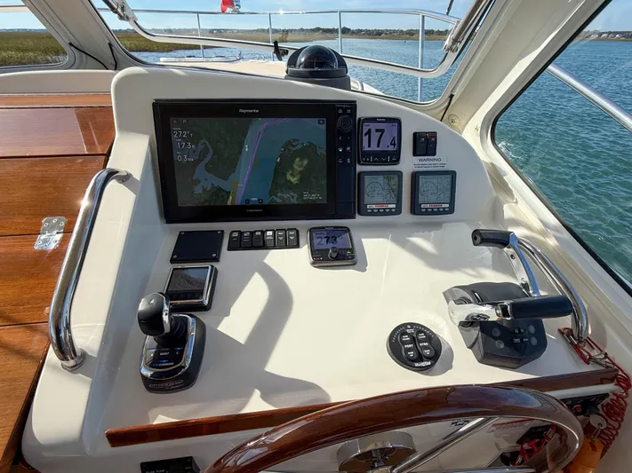 Wild Rose Yacht Photos Pics Helm of 2015 MJM 36z Downeast boat with navigation equipment and controls.