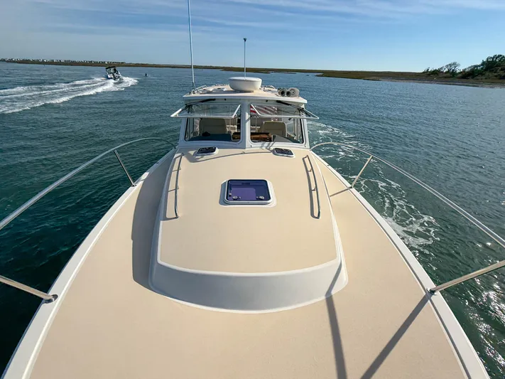 Wild Rose Yacht Photos Pics 2015 MJM 36z Downeast boat cruising on open water.