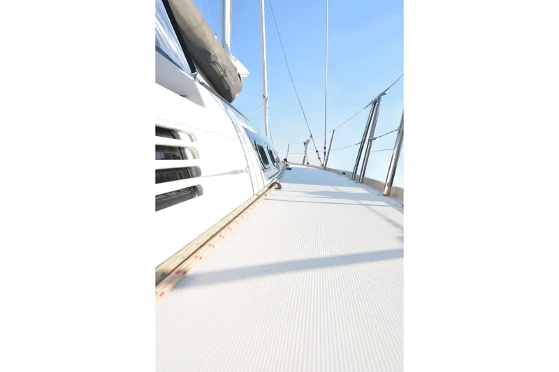  Yacht Photos Pics 2018 Dufour 520 Grand Large sailboat deck with clear blue sky.