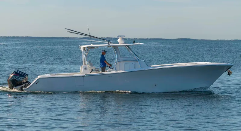 Catch 22 Yacht Photos Pics 2021 Front Runner 36 Center Console boat cruising on open water.