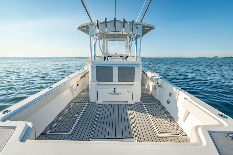 Catch 22 Yacht Photos Pics 2021 Front Runner 36 Center Console boat on calm ocean waters.