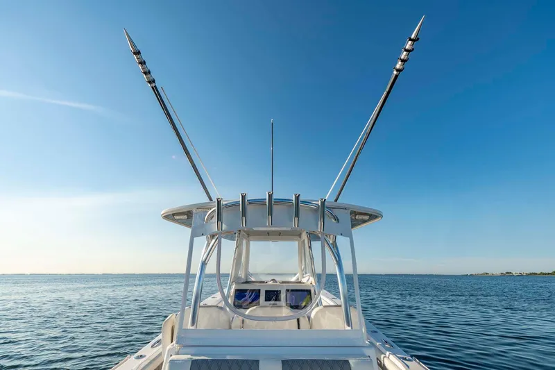 Catch 22 Yacht Photos Pics 2021 Front Runner 36 Center Console boat on open water, clear blue sky.