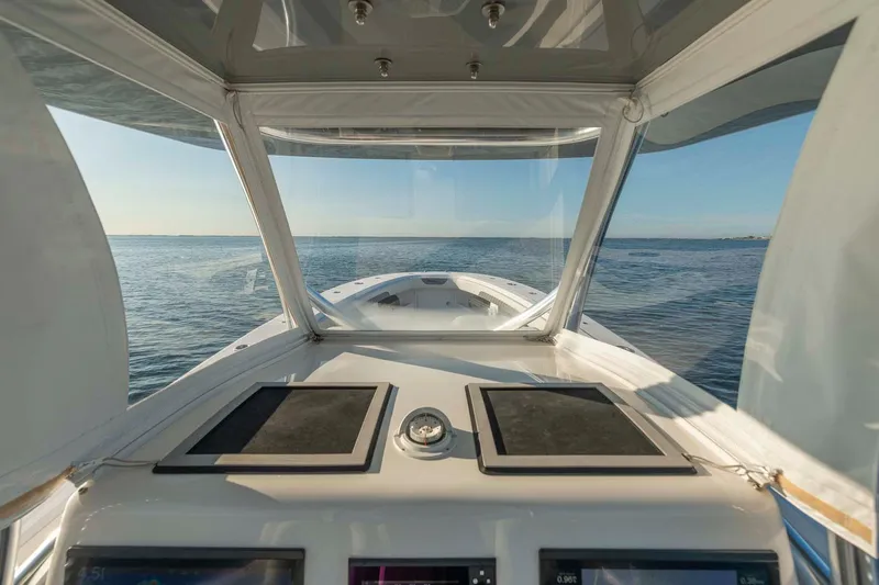 Catch 22 Yacht Photos Pics 2021 Front Runner 36 Center Console boat interior view on open water.