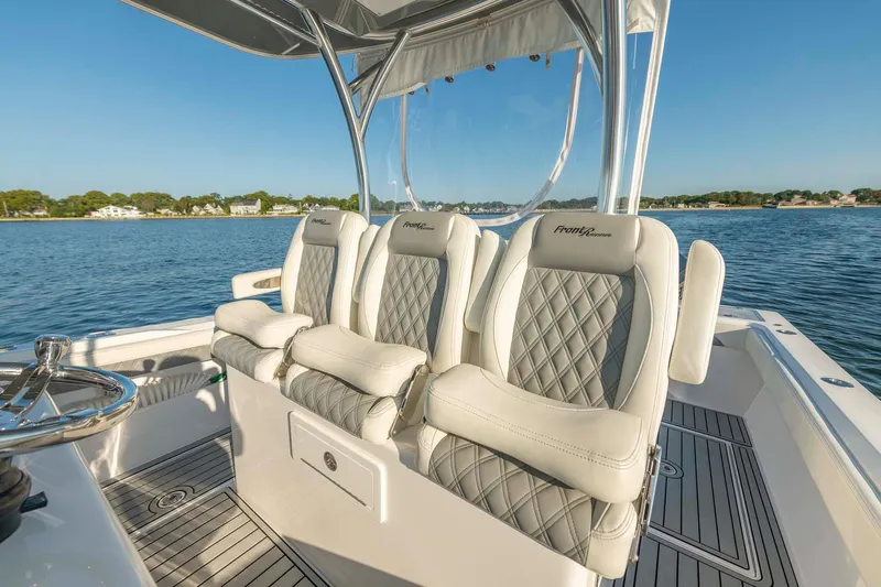 Catch 22 Yacht Photos Pics 2021 Front Runner 36 Center Console boat with luxurious seating on a sunny day.