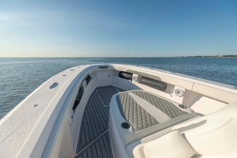 Catch 22 Yacht Photos Pics 2021 Front Runner 36 Center Console boat on calm ocean waters.