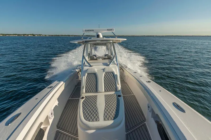 Catch 22 Yacht Photos Pics 2021 Front Runner 36 Center Console boat cruising on open water.