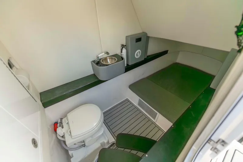 Catch 22 Yacht Photos Pics 2021 Front Runner 36 Center Console interior with toilet and sink.