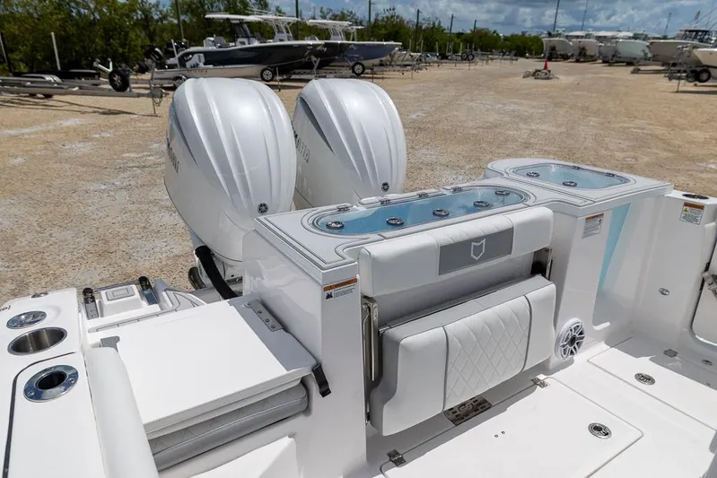  Yacht Photos Pics 2026 Sea Fox 288 Commander boat with dual engines and sleek white interior design.