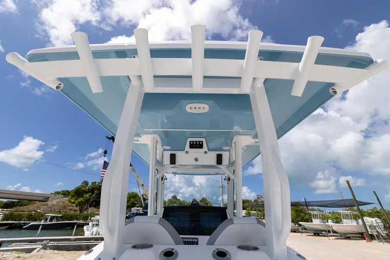  Yacht Photos Pics 2026 Sea Fox 288 Commander boat with sleek design and modern features under a blue sky.